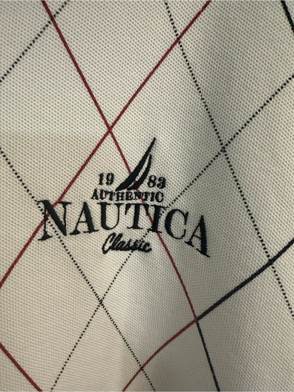 Nautica Men’s White Polo with Navy Collar and Red/Navy Argyle Lines